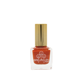  This Burt orange with shimmer will have you feeling really spicy while talking about This that & the third!